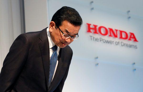 Honda Motor Chief Executive Takahiro Hachigo bows his head as he arrives at a news conference in Tokyo, Japan, on Feb. 19, 2019. (Kim Kyung-hoon/Reuters)