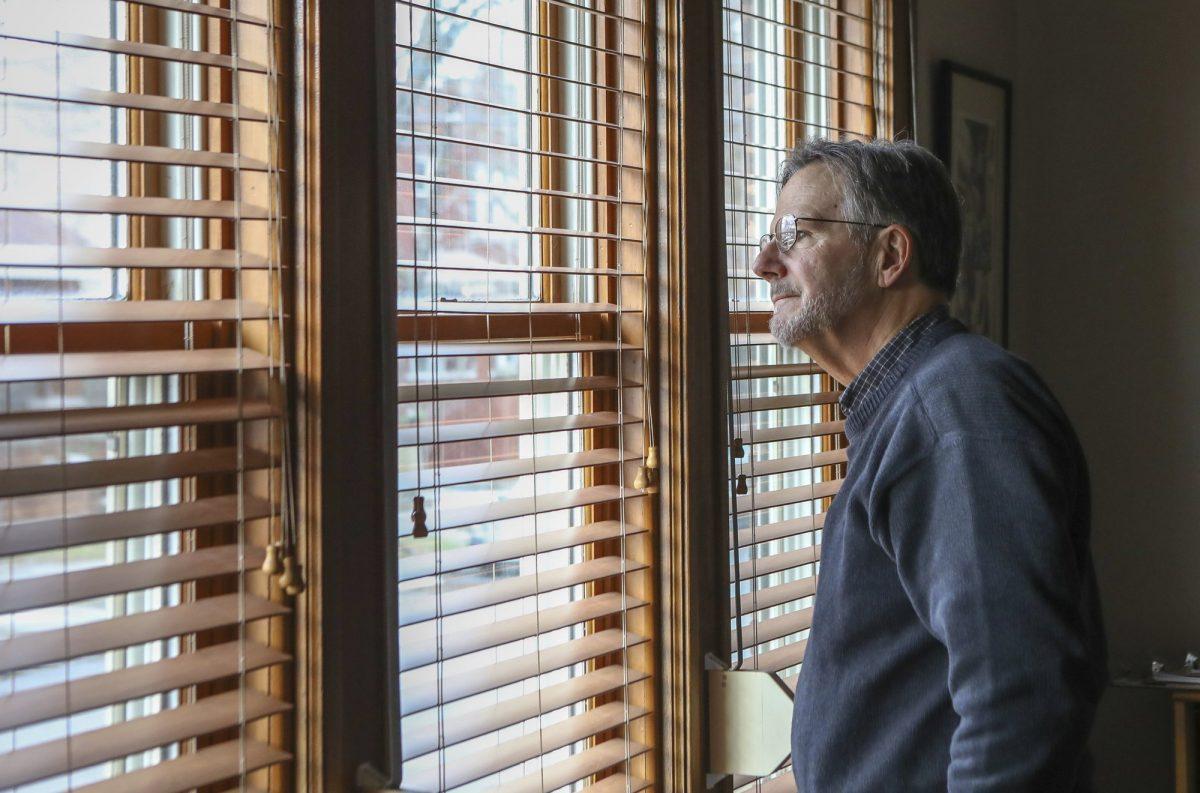 John Kriegshauser, nephew of Lt. John G. Kriegshauser, looks out the window of his home in Chicago on Feb. 14, 2019. (Teresa Crawford/AP Photo)