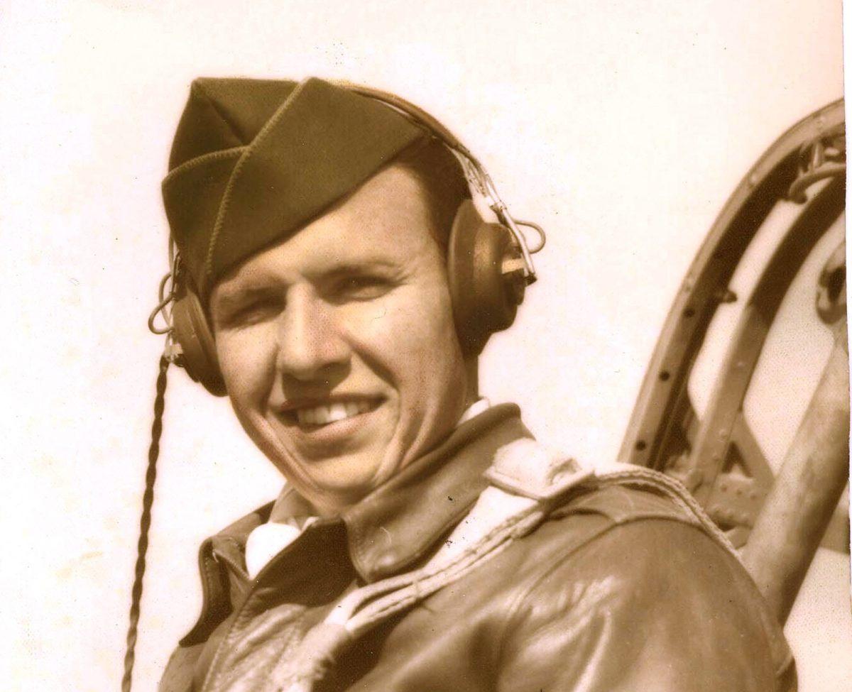 Lt. John G. Kriegshauser sitting in the cockpit of a plane. (The Kriegshauser family via AP)