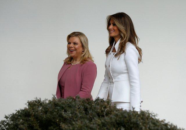 First Lady Melania Trump (R) escorts Sara Netanyahu along the Colonnade at the White House in Washington, on Feb. 15, 2017. (Kevin Lamarque/Reuters)