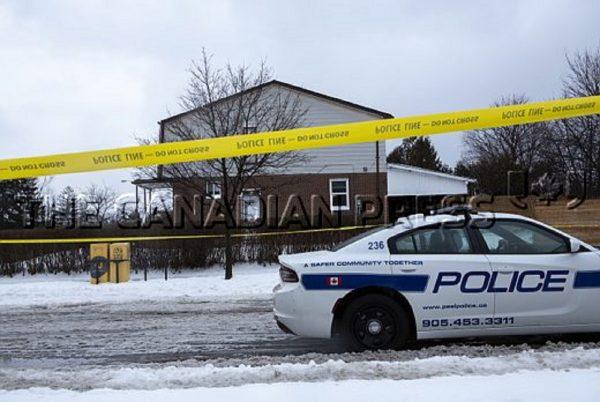 Police tape is seen outside of a house where a young girl was found dead in Brampton, Ont., Canada on Feb. 15, 2019. (Andrew Ryan/The Canadian Press)