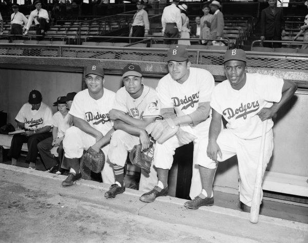 Roy Campanella (L), Larry Doby, Don Newcombe and Jackie Robinson pose at the 16th annual All-Star Game at Ebbetts Field in Brooklyn, N.Y., on July 12, 1949. (Photo/AP)