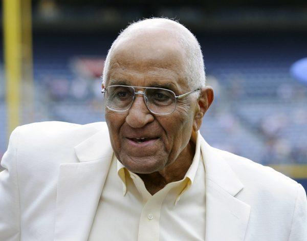 Former Dodgers pitcher Don Newcombe stands on the field at Turner Field, where he received the Beacon of Hope Award before the Civil Rights Game, in Atlanta., on Aug. 18, 2012. (John Amis/AP)