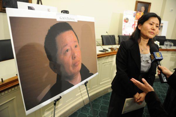 Geng He, the wife of Chinese dissident Gao Zhisheng, participates in a press conference on Capitol Hill in Washington, on Jan. 18, 2011. (Tim Sloan/AFP/Getty Images)