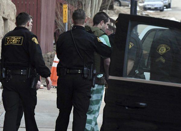 Patrick Frazee is escorted to an awaiting SUV after a hearing at the Teller County Courthouse in Cripple Creek, Colo., on Feb. 19, 2019. (Jerilee Bennett/The Gazette/AP)