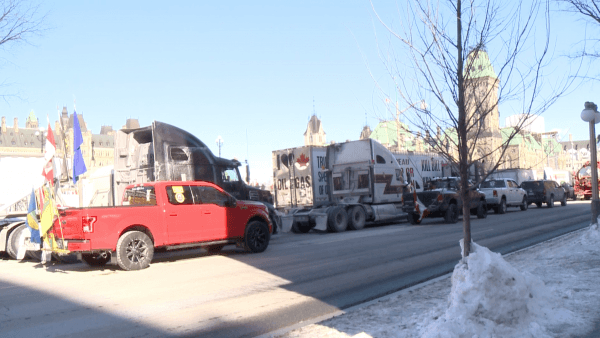 Trucks and vehicles of the "United We Roll" convoy parked in front of Parliament Hill to support Canada's energy sector in Ottawa on Feb. 19, 2019. (NTDTV)
