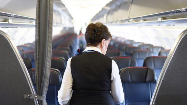 Flight attendant. (Eric Baradat/Getty Images)