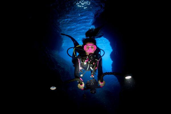 Sarah Gauthier filming sharks in an underwater cave in the Philippines. (Kevin Michael Gacad)