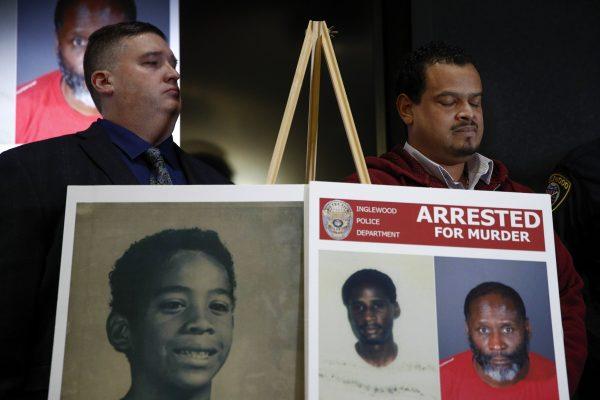 Hubert Tillett, right, brother of William Tillett, stands behind a display showing his brother, bottom left, during a news conference in Inglewood, Calif., on Feb. 20, 2019. (Jae C. Hong/AP)