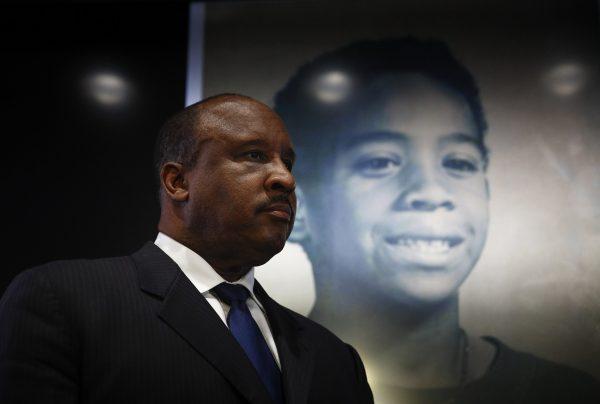 Inglewood Mayor James Butts stands in front of a photo of William Tillett during a news conference in Inglewood, Calif., on Feb. 20, 2019. (Jae C. Hong/AP)