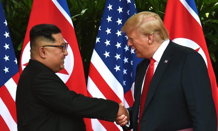 North Korea’s Kim Arrives in Vietnam for Summit; Trump on His Way