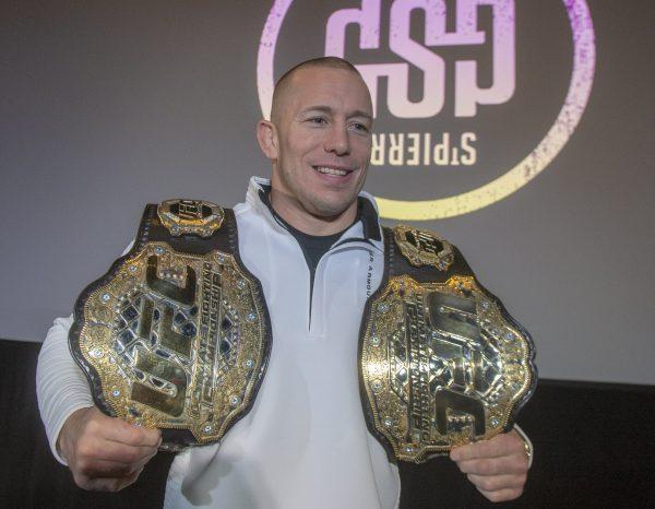 Canada's Georges St-Pierre announces his retirement from mixed martial arts during a press conference in Montreal, on Feb. 21, 2019. (Ryan Remiorz/The Canadian Press via AP)