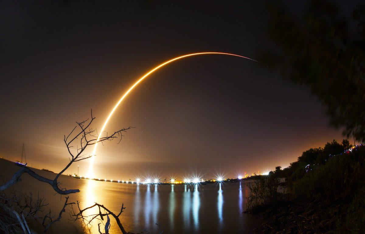 A time exposure from the shore of the Banana River near Port Canaveral of the launch of the SpaceX Falcon 9 rocket from Cape Canaveral, Fla., Thursday, Feb. 21, 2019. (Malcolm Denemark/Florida Today via AP)