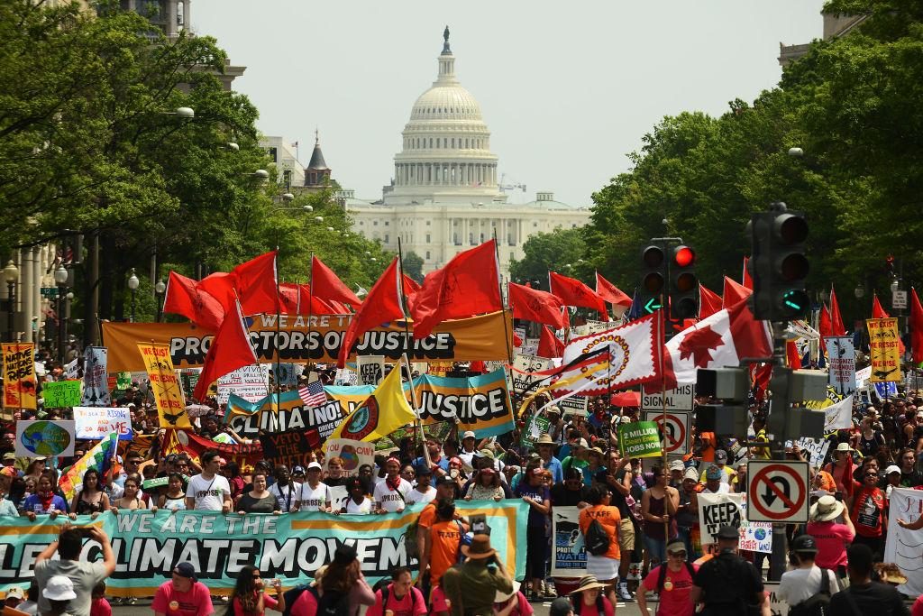 Environmentalists hold a protest march from the U.S. Capitol in Washington on April 29, 2017. (Astrid Riecken/Getty Images)