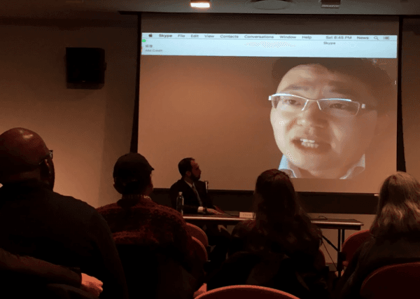 “Letter From Masanjia” creator Leon Lee joins a New York University audience via Skype after a screening of his film, Feb. 16, 2019. (The Epoch Times)