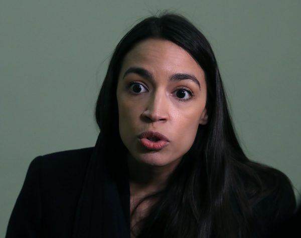 Rep. Alexandria Ocasio-Cortez speaks to the media about Amazon scrapping its plans to build a new headquarters in Queens, New York, on Capitol Hill on Feb. 14, 2019. (Mark Wilson/Getty Images)