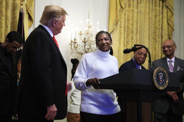 President Donald Trump listens to Catherine Toney speak during a National African American History Month reception in the East Room of the White House in Washington, on Feb. 21, 2019. (AP Photo/Manuel Balce Ceneta)