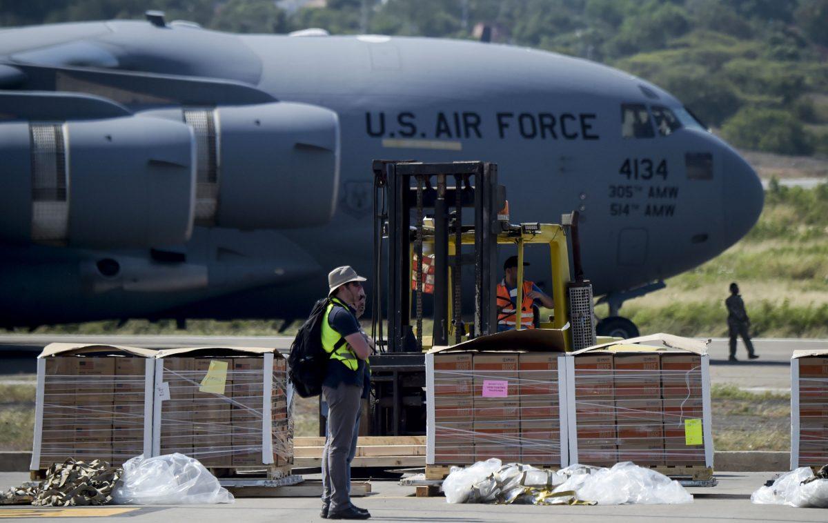 Food and medicine aid for Venezuela is unloaded from a US Air Force C-17 aircraft at Camilo Daza International Airport in Cucuta, Colombia in the border with Venezuela on Feb. 16, 2019. (Raul Arboleda/AFP/Getty Images)