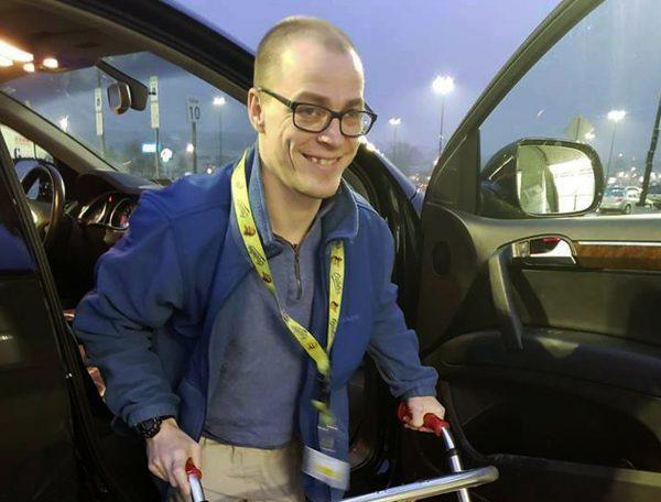 Adam Catlin gets out of a car before starting his shift at a Walmart in Selinsgrove, Pa., on Dec. 14, 2018. (Holly Catlin via AP)