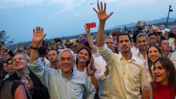 Chile's President Sebastian Pinera, and Venezuelan opposition leader Juan Guaidó, Colombia's President Ivan Duque, Paraguay's President Mario Abdo Benitez and Organization of American States (OAS) Secretary General Luis Almagro, attend the "Venezuela Live Aid" concert at the Tienditas cross-border bridge between Colombia and Venezuela, in Cucuta, Colombia, on Feb. 22, 2019. (Marcelo Segura/Courtesy of Chilean Presidency/Handout via Reuters)