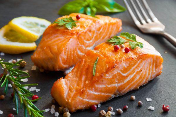 Delicious cooked salmon fish fillets (Maria Uspenskaya/Shutterstock)