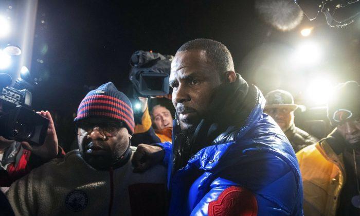 R. Kelly Arrested, Charged in Chicago With Sexual Abuse