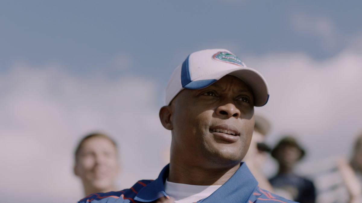 Florida scout (Eddie George) is impressed with Zach’s on-the-field talent in “Run the Race.” (RTR Movie Holdings, LLC)