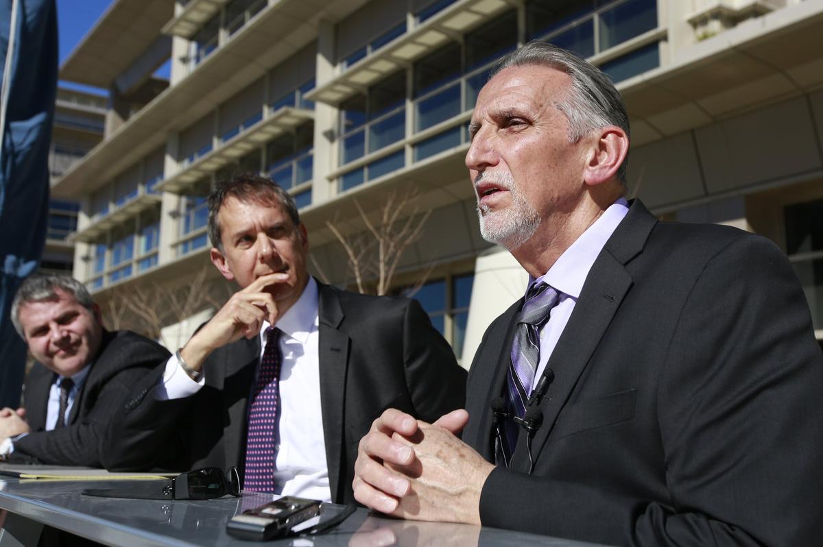 Craig Coley, right, accompanied by his attorneys Ron Kaye, center, and Nick Brustin, left, talks with reporters in Sacramento, Calif. on Feb. 15, 2018. (Rich Pedroncelli/AP)
