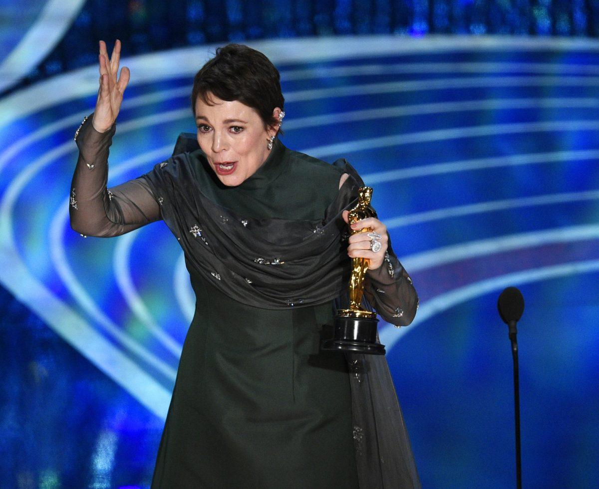 Olivia Colman reacts as she accepts the award for best performance by an actress in a leading role for "The Favourite" at the Oscars, at the Dolby Theatre in Los Angeles on Feb. 24, 2019. (Chris Pizzello/Invision/AP)