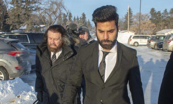 Jaskirat Singh Sidhu, right, the driver of the truck that struck the bus carrying the Humboldt Broncos hockey team, arrives with his lawyer Mark Brayford for the third day of his sentencing hearing in Melfort, Sask, on Jan. 30, 2019. (The Canadian Press/Ryan Remiorz)