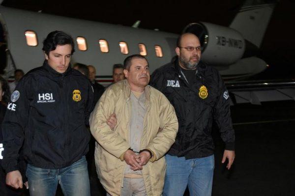 Mexico's top drug lord Joaquin "El Chapo" Guzman is escorted as he arrives at Long Island MacArthur airport in New York on Jan. 19, 2017, after his extradition from Mexico. (U.S. officials/Handout/Reuters)