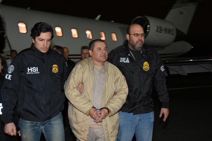 Mexico's top drug lord Joaquin "El Chapo" Guzman is escorted as he arrives at Long Island MacArthur airport in New York on Jan. 19, 2017, after his extradition from Mexico. (U.S. officials/Handout/Reuter)