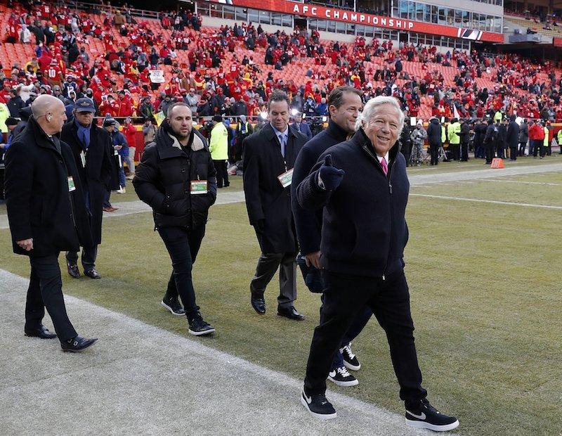 New England Patriots owner Robert Kraft (R), arrives on the field before the AFC Championship NFL football game between the Kansas City Chiefs and the New England Patriots, in Kansas City, Mo. On Jan. 20, 2019. (Charlie Neibergall/File/AP Photo)
