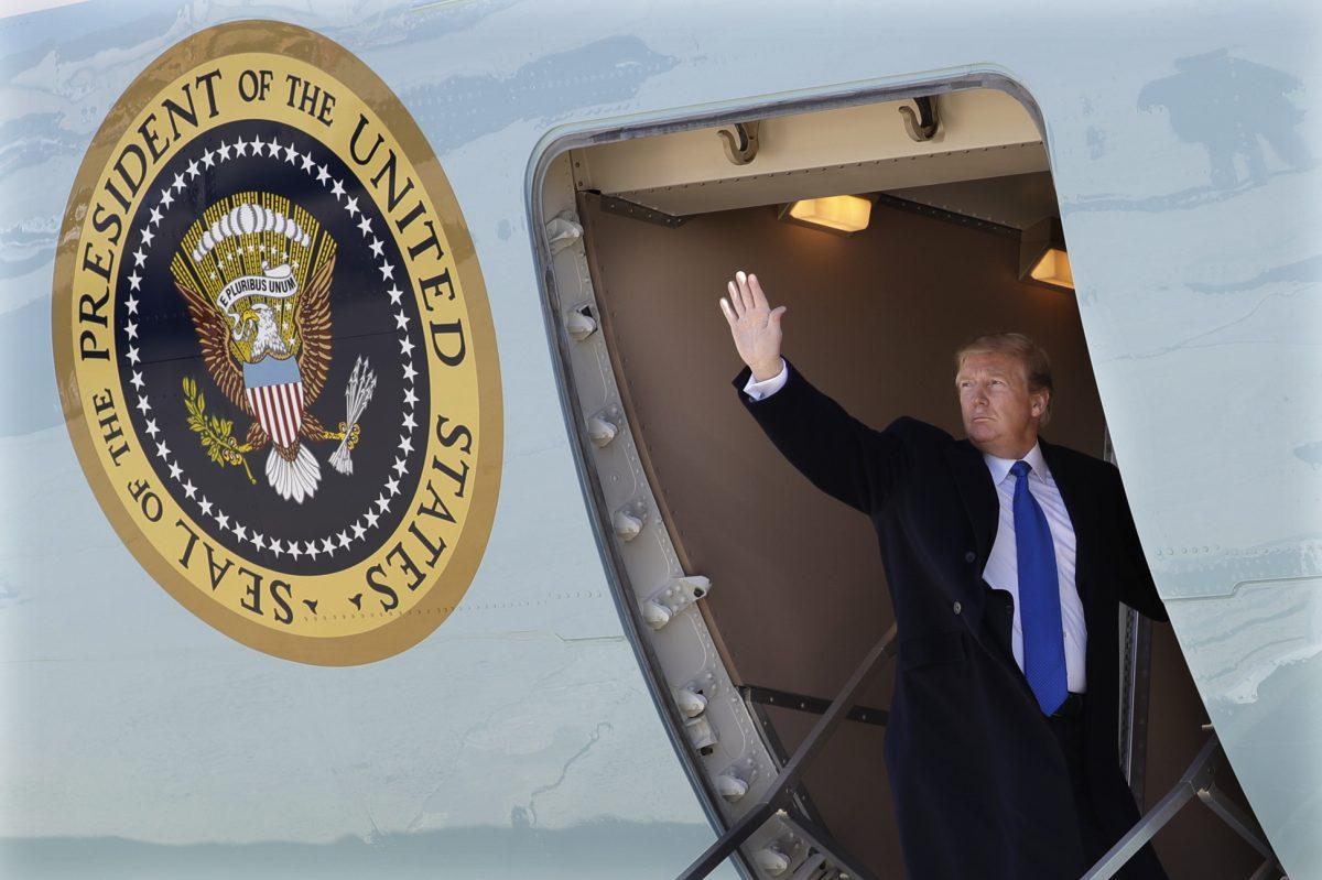 President Donald Trump walks to board Air Force One for a trip to Vietnam to meet with North Korean leader Kim Jong Un, Andrews Air Force Base, Feb. 25, 2019. (AP Photo/ Evan Vucci)