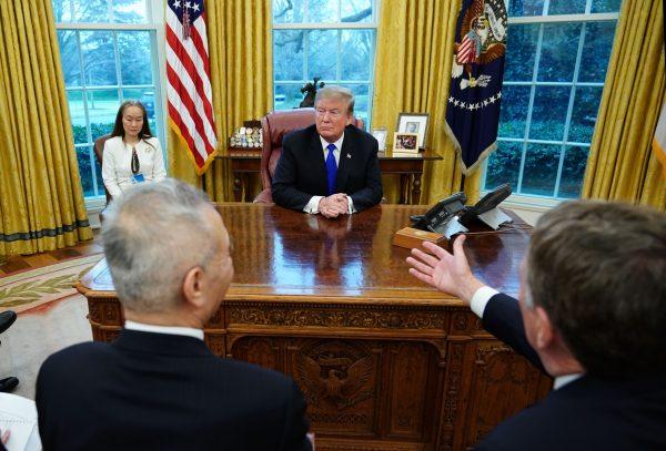 Trade Representative Robert Lighthizer (front R) gestures while speaking to President Donald Trump during a meeting with China's Vice Premier Liu He (L) in the Oval Office of the White House in Washington on Feb. 22, 2019. (Mandel Ngan/AFP/Getty Images)