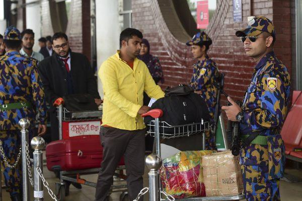 Bangladeshi security personnel at Hazrat Shahjalal International Airport in Dhaka on Feb. 25, 2019. (Munir Uz Zaman/AFP/Getty Images)