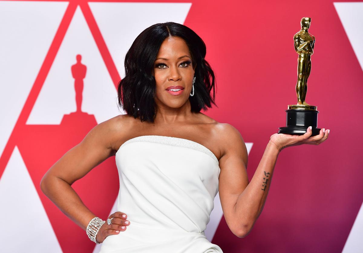 Regina King accepts the award for best performance by an actress in a supporting role for "If Beale Street Could Talk" at the Oscars on Feb. 24, 2019, at the Dolby Theatre in Los Angeles. (Chris Pizzello/Invision/AP)