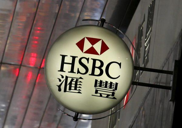 A logo of HSBC is displayed outside a branch at the financial Central district in Hong Kong, China on June 2, 2015. (Bobby Yip/Reuters)