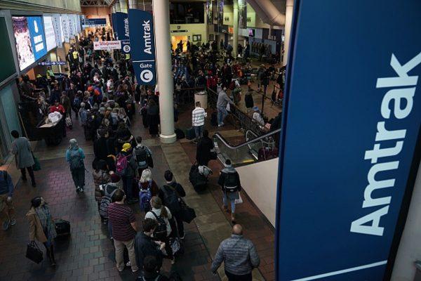 Passengers wait to board an Amtrak train at Union Station on the day before the Thanksgiving holiday, in Washington, on Nov. 21, 2018. (Alex Wong/Getty Images)