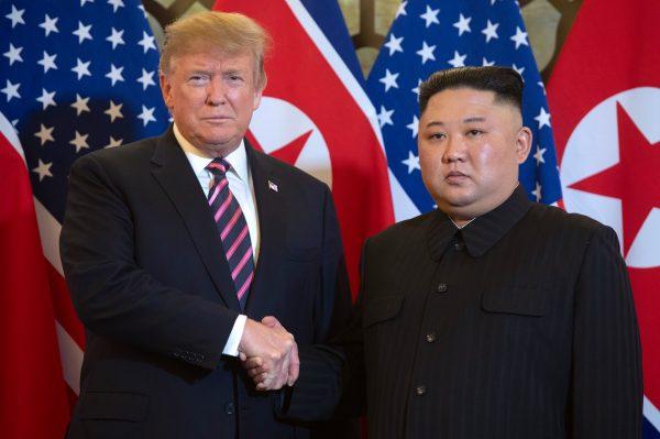 President Donald Trump with North Korea's leader Kim Jong Un before a meeting at the Sofitel Legend Metropole hotel in Hanoi, on Feb. 27, 2019. (Saul Loeb/AFP/Getty Images)