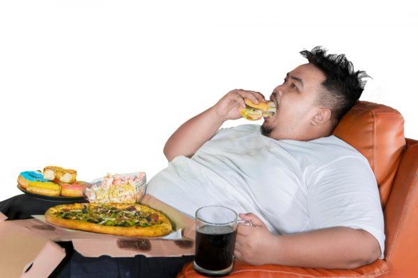 Out of control eating (Creativa Images/Shutterstock)