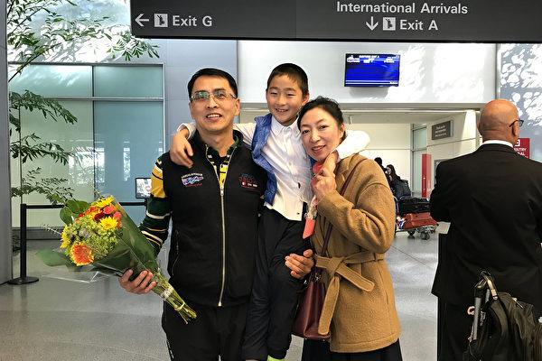 Yu Ming is greeted by his wife and son at San Francisco International Airport on Jan. 27, 2019. (The Epoch Times)
