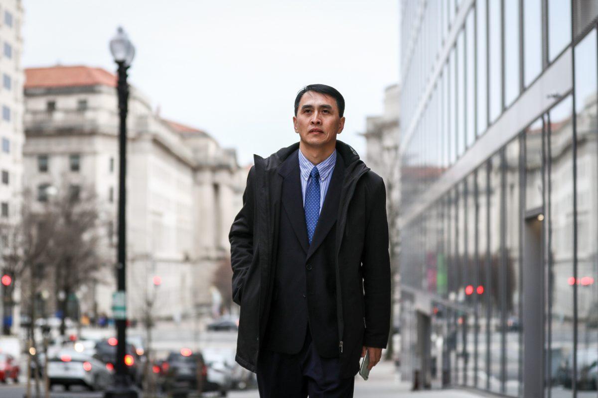 Businessman Yu Ming in Washington on Feb. 19, 2019. He arrived in the United States to join his wife, daughter, and son in January 2019 through the help of the U.S. government, after being imprisoned for 12 years and tortured nearly to death in labor camps in China for his beliefs in Falun Gong. (Samira Bouaou/The Epoch Times)