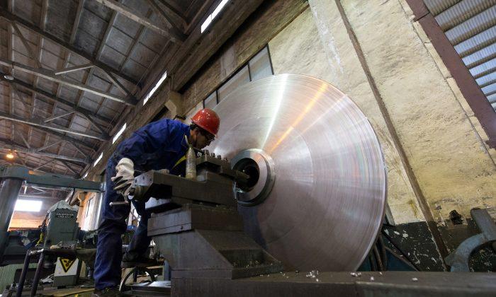 China February Factory Activity Shrinks to 3-Year Low; Export Orders Worst in a Decade