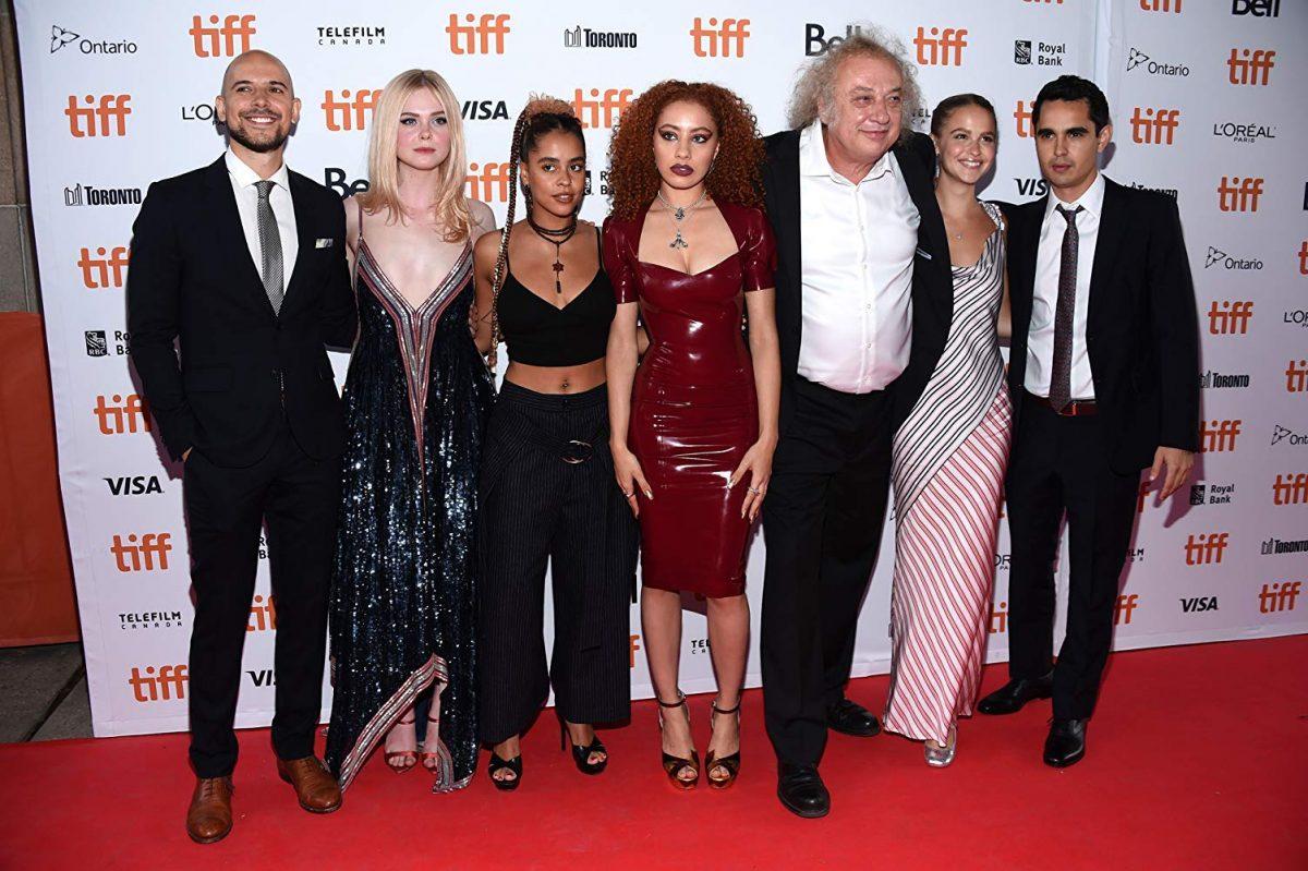 (L–R) Producer Fred Berger, actors Elle Fanning, Olive Gray, Ursula Holliday, Zlatko Buric, and Clara Rugaard, and director Max Minghella, at a media event for Minghella’s “Teen Spirit.” (Amanda Edwards/Getty Images)