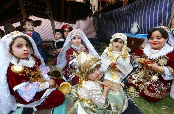 Libyan girls dressed in traditional outfits attend a school event in the Tajoura area in the capital Tripoli on April, 27, 2017. (©Getty Images | <a href="https://www.gettyimages.com/detail/news-photo/libyan-girls-dressed-in-traditional-outfits-attend-a-school-news-photo/674074154">Mahmud Turkia/AFP</a>)