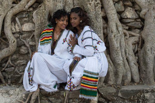 Women pose for a photograph in traditional Ethiopian dress during the annual Timkat Epiphany celebration on Jan. 19, 2017, in Gondar, Ethiopia. (©Getty Images | <a href="https://www.gettyimages.com/detail/news-photo/women-pose-for-a-photograph-in-traditional-ethiopian-dress-news-photo/632091788">Carl Court</a>)