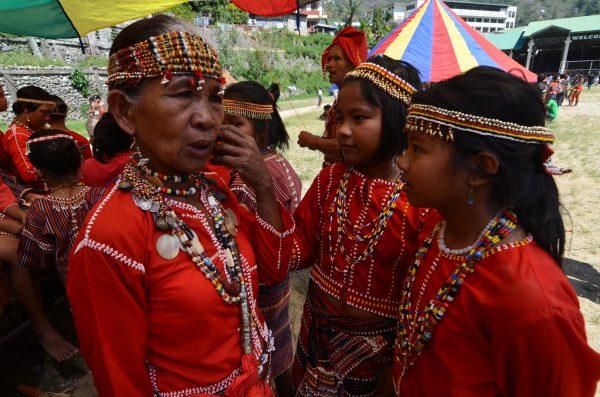 Ethnic Igorot mountain folk decked in their traditional attire wait for the start of the parade during the celebration of the Lang Ay Festival in Bontoc on April 6, 2013, in Mountain Province, Philippines. The annual Lang Ay festival commemorates the anniversary of the foundation of the Mountain Province with street dances, theatrical performances, sporting events, and agricultural trade fairs that showcase the rich local history and culture of different mountain tribes in the northern Philippines. (©Getty Images | <a href="https://www.gettyimages.com/detail/news-photo/ethnic-igorot-mountain-folk-decked-in-their-traditional-news-photo/165785225">Dondi Tawatao</a>)