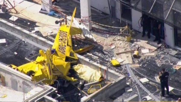 A small banner plane crashed into a building along a Florida beach on March 1, 2019. (Screenshot/Fox)