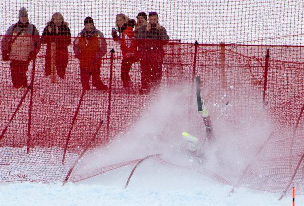  A skier crashes into the fencing during the men's downhill of FIS Ski World cup in Kitzbuehel, Austria on Jan. 23, 2016. (Joe Klamar/AFP/Getty Images)